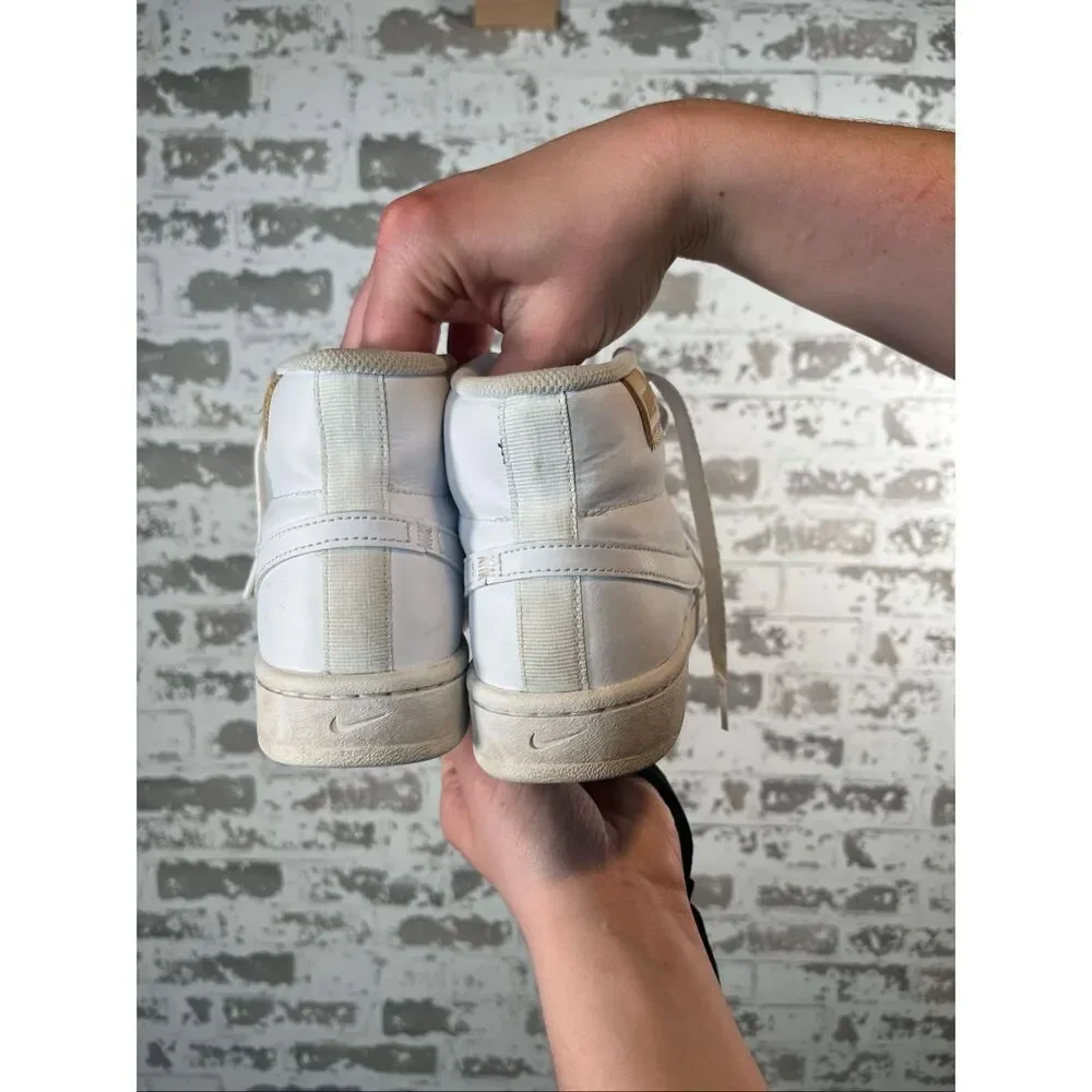 Nike | women white leather high top shoes